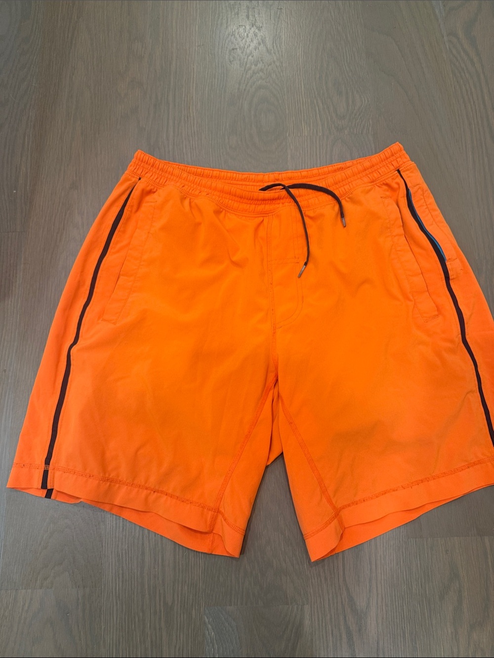 lululemon athletica Men’s Athletic Shorts in Bright Orange with Black Trim - Picture 1 of 6